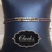 Clarks Diamond Jewelers - Two Separate Brass Slipknot Bracelets Brown