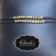 Clarks Diamond Jewelers - Two Brass Cube Slipknot Bracelets Black